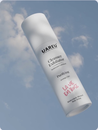 UAREU Cleanser Exfoliator against a blue sky
